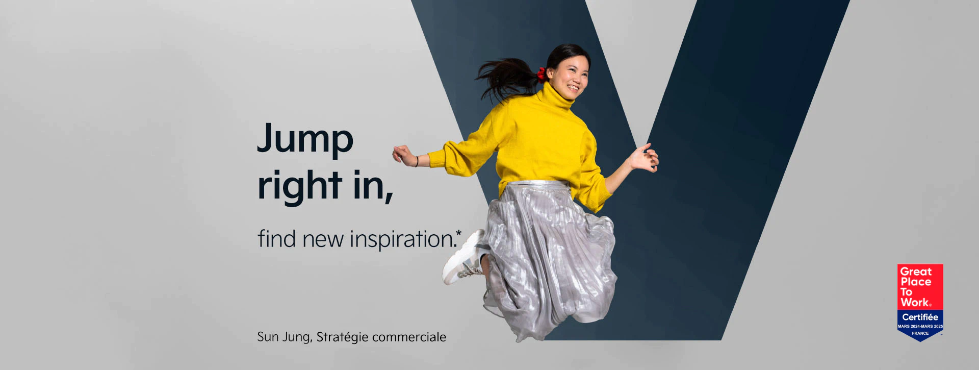 Sun from our Business Strategy department is jumping and smiling in front of the letter "V". Next to her we find our statement: "Jump right in - find new inspiration".