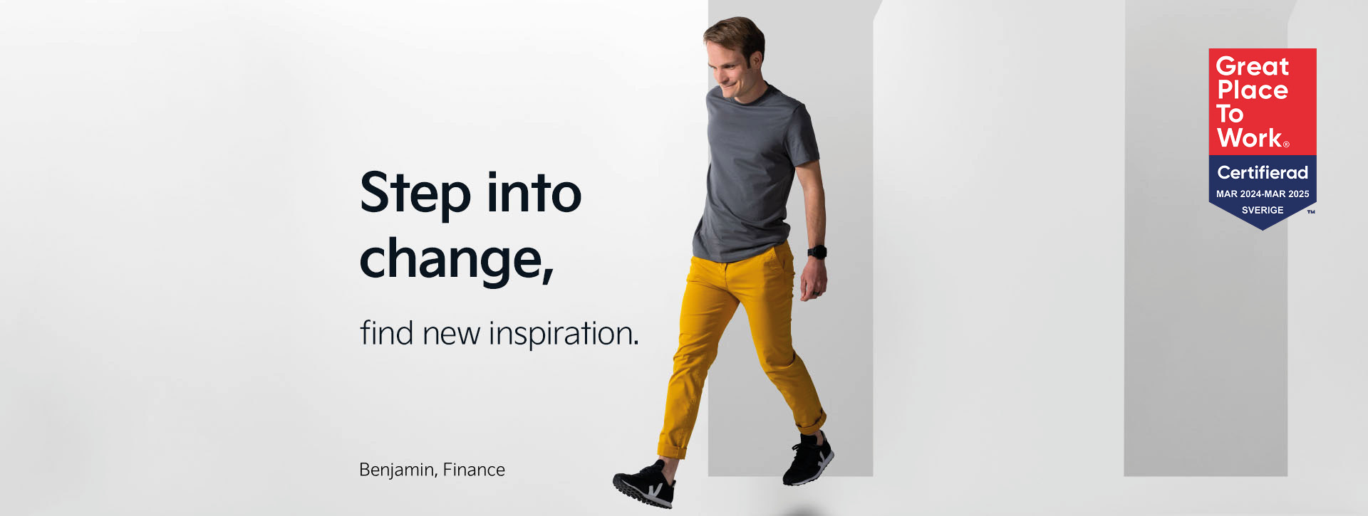 Benjamin from our Finance department makes a step forward. Behind him is the letter "M". Next to him we find the statement "Step into change - find new inspiration".