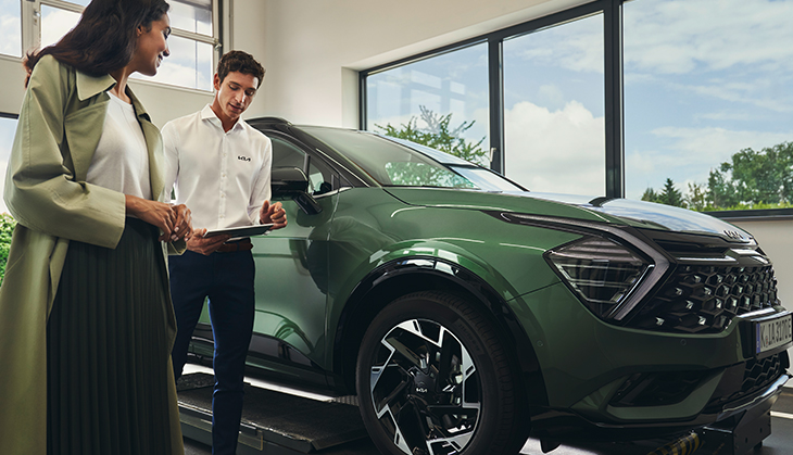 Service Advisor conducting a vehicle handover with customer